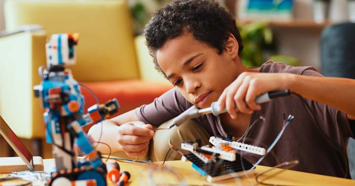 Middle school student engaging in a hands-on school activity  - Connections Academy