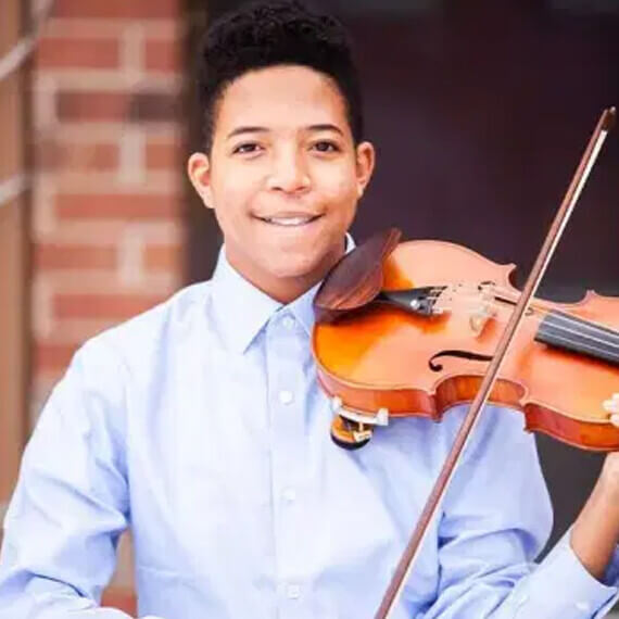 Connections Academy student Leon with his violin.
