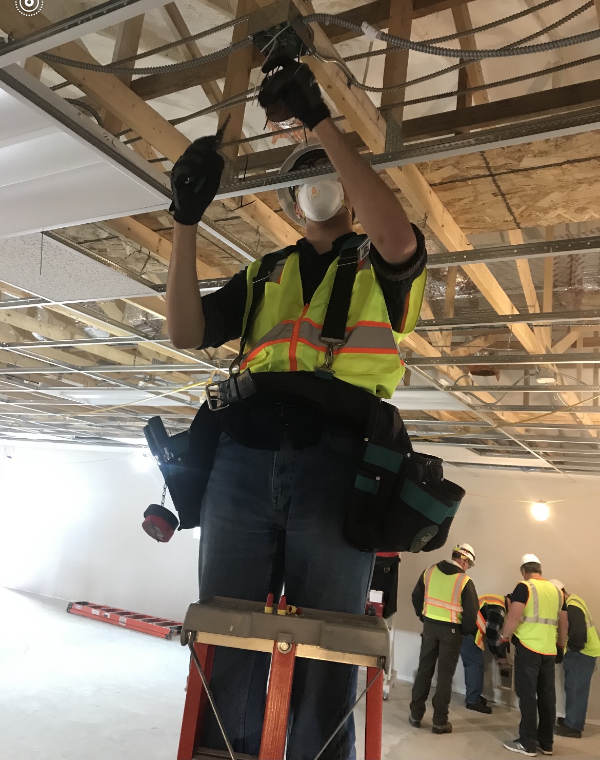 Neil participating in a construction project
