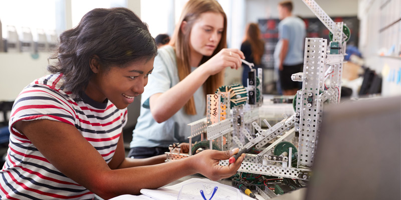 Two students engaging in a STEM activity